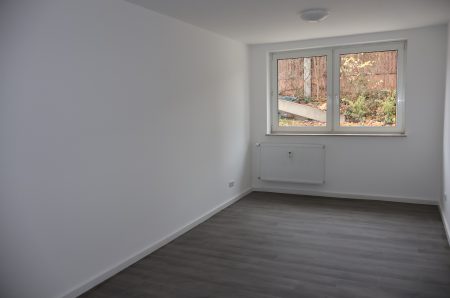 Wohnzimmer der KfW 70 sanierten Erdgeschosswohnung